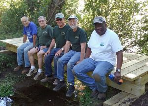 Vernon Greenways Volunteers and their new bridge.