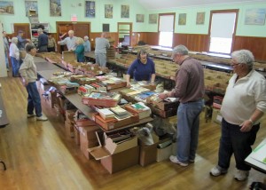 Sorting books for the Vernon Historical Society's annual sale.